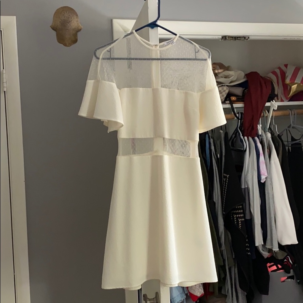 Beautiful white dress with mesh exposure